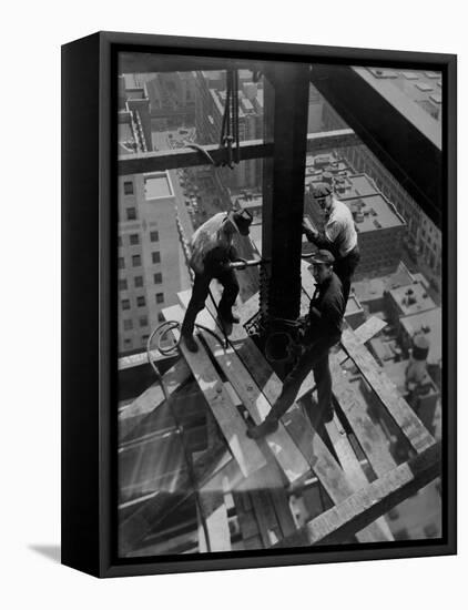 Workmen Attach Steel Beams Above Street During Construction of the Manhattan Company Building-Arthur Gerlach-Framed Premier Image Canvas