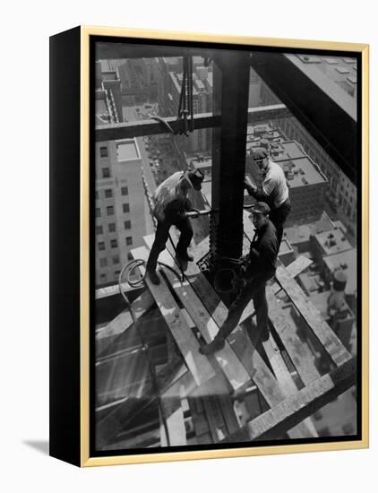 Workmen Attach Steel Beams Above Street During Construction of the Manhattan Company Building-Arthur Gerlach-Framed Premier Image Canvas