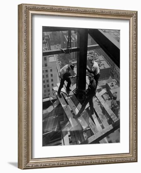 Workmen Attach Steel Beams Above Street During Construction of the Manhattan Company Building-Arthur Gerlach-Framed Photographic Print