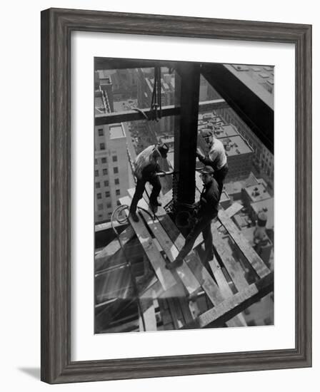 Workmen Attach Steel Beams Above Street During Construction of the Manhattan Company Building-Arthur Gerlach-Framed Photographic Print