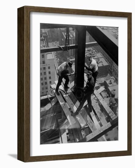 Workmen Attach Steel Beams Above Street During Construction of the Manhattan Company Building-Arthur Gerlach-Framed Photographic Print