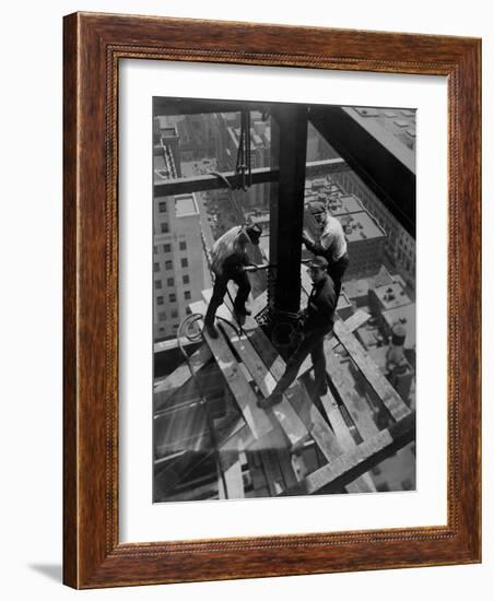 Workmen Attach Steel Beams Above Street During Construction of the Manhattan Company Building-Arthur Gerlach-Framed Photographic Print