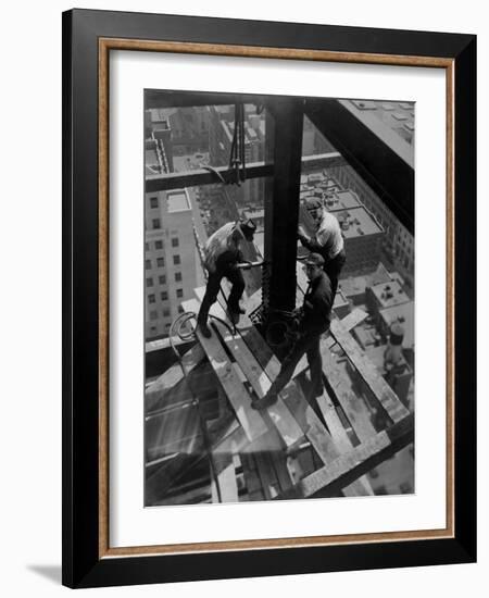 Workmen Attach Steel Beams Above Street During Construction of the Manhattan Company Building-Arthur Gerlach-Framed Photographic Print