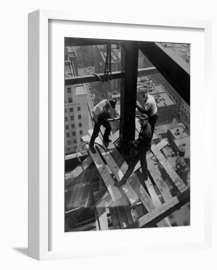 Workmen Attach Steel Beams Above Street During Construction of the Manhattan Company Building-Arthur Gerlach-Framed Photographic Print