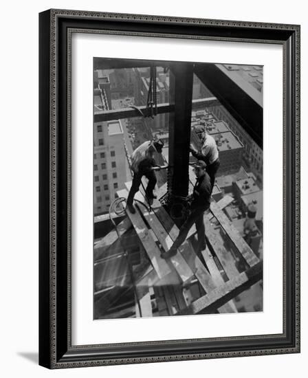 Workmen Attach Steel Beams Above Street During Construction of the Manhattan Company Building-Arthur Gerlach-Framed Photographic Print