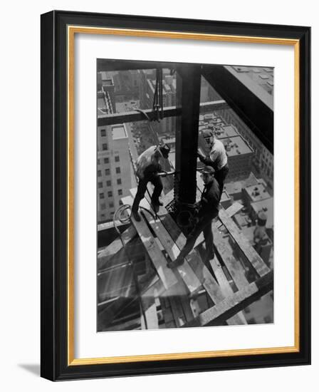 Workmen Attach Steel Beams Above Street During Construction of the Manhattan Company Building-Arthur Gerlach-Framed Photographic Print