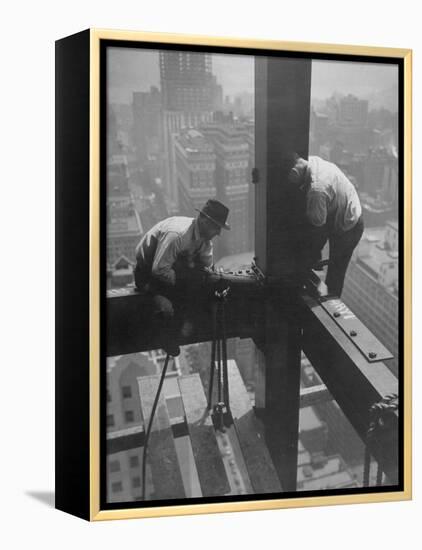 Workmen Attaching Steel Beams High Above Street During Construction of Manhattan Company Building-Arthur Gerlach-Framed Premier Image Canvas