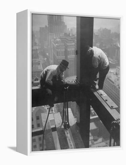 Workmen Attaching Steel Beams High Above Street During Construction of Manhattan Company Building-Arthur Gerlach-Framed Premier Image Canvas