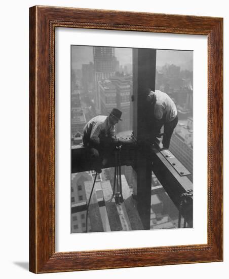 Workmen Attaching Steel Beams High Above Street During Construction of Manhattan Company Building-Arthur Gerlach-Framed Photographic Print