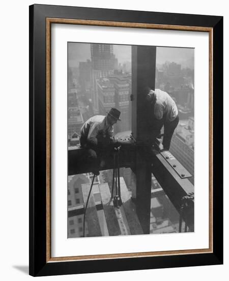 Workmen Attaching Steel Beams High Above Street During Construction of Manhattan Company Building-Arthur Gerlach-Framed Photographic Print