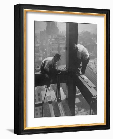 Workmen Attaching Steel Beams High Above Street During Construction of Manhattan Company Building-Arthur Gerlach-Framed Photographic Print