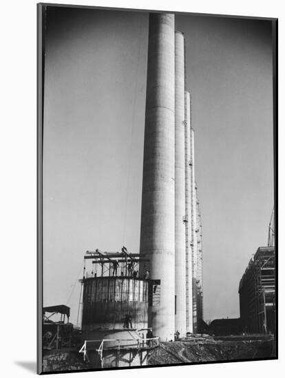 Workmen Building Huge Chimneys at World's Biggest Coal-Fueled Power Plant-Margaret Bourke-White-Mounted Photographic Print