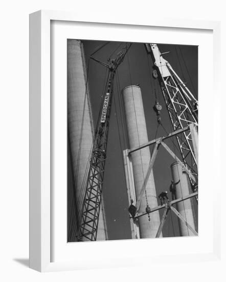 Workmen Builiding Chimneys at World's Biggest Coal-Fueled Generating Plant-Margaret Bourke-White-Framed Photographic Print