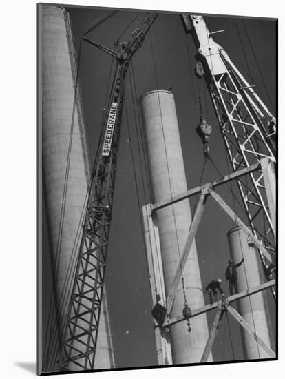 Workmen Builiding Chimneys at World's Biggest Coal-Fueled Generating Plant-Margaret Bourke-White-Mounted Photographic Print