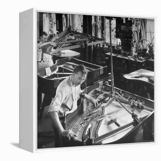 Workmen Installing Steel String Frames Into Grand Piano Cabinets at Steinway Piano Factory-Margaret Bourke-White-Framed Premier Image Canvas