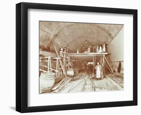 Workmen Tiling the Rotherhithe Tunnel, London, December 1907-null-Framed Photographic Print