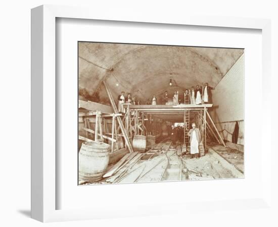 Workmen Tiling the Rotherhithe Tunnel, London, December 1907-null-Framed Photographic Print