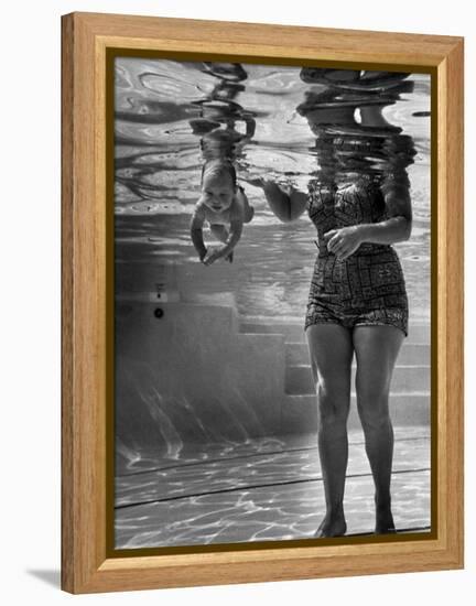 World's Youngest Swimmer Julie Sheldon, 9 Weeks Old, Swimming Underwater-Ed Clark-Framed Premier Image Canvas