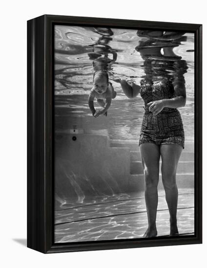 World's Youngest Swimmer Julie Sheldon, 9 Weeks Old, Swimming Underwater-Ed Clark-Framed Premier Image Canvas