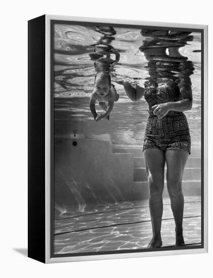 World's Youngest Swimmer Julie Sheldon, 9 Weeks Old, Swimming Underwater-Ed Clark-Framed Premier Image Canvas