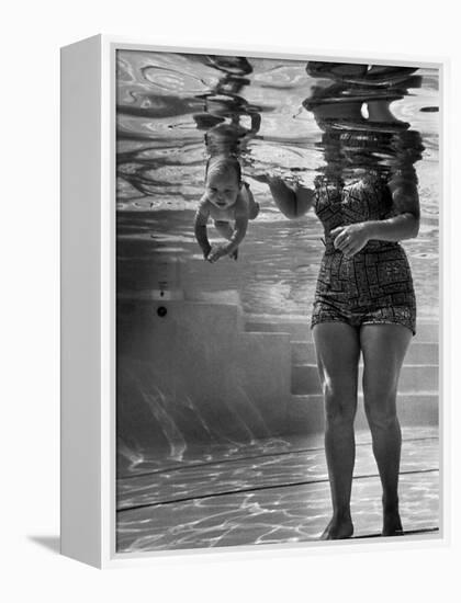 World's Youngest Swimmer Julie Sheldon, 9 Weeks Old, Swimming Underwater-Ed Clark-Framed Premier Image Canvas