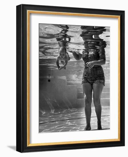 World's Youngest Swimmer Julie Sheldon, 9 Weeks Old, Swimming Underwater-Ed Clark-Framed Photographic Print