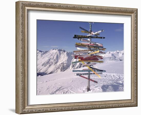 Worldwide Signpost in Ischgl, Austria-Martina Bleichner-Framed Art Print