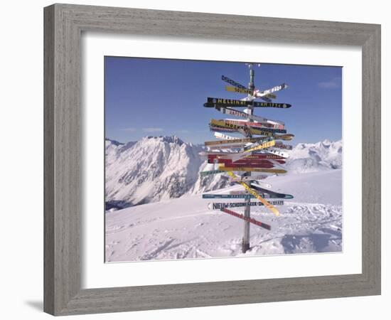 Worldwide Signpost in Ischgl, Austria-Martina Bleichner-Framed Art Print