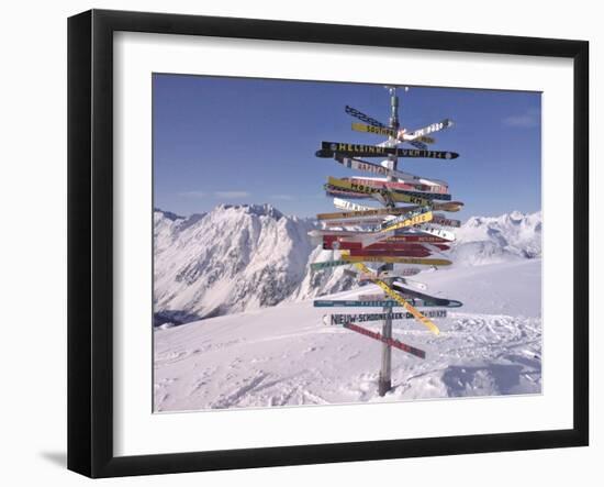 Worldwide Signpost in Ischgl, Austria-Martina Bleichner-Framed Art Print