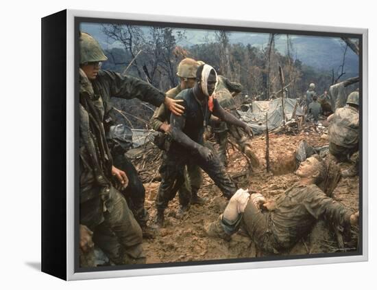 Wounded Marine Gunnery Sgt. Jeremiah Purdie During the Vietnam War-Larry Burrows-Framed Premier Image Canvas