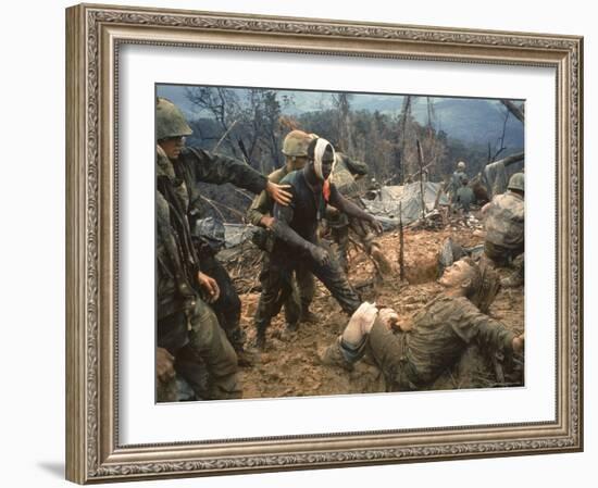 Wounded Marine Gunnery Sgt. Jeremiah Purdie During the Vietnam War-Larry Burrows-Framed Photographic Print