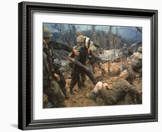 Wounded Marine Gunnery Sgt. Jeremiah Purdie During the Vietnam War-Larry Burrows-Framed Photographic Print