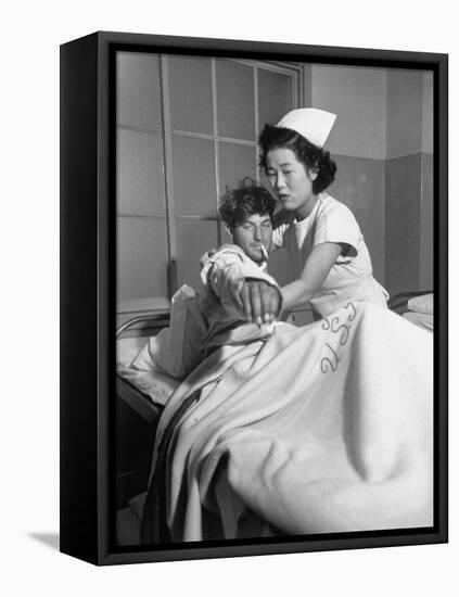 Wounded Marine Walter McCorkle Being Treated at a Hospital in Japan-null-Framed Premier Image Canvas