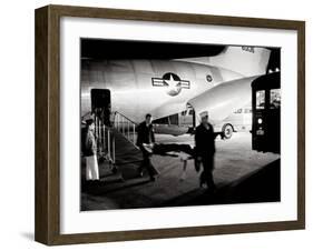Wounded Servicemen Arriving from Vietnam at Andrews Air Force Base, 1968-Warren K. Leffler-Framed Photo