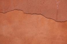 Old Terracotta Painted Stucco Wall with Cracked Plaster. Backgro-wrangel-Photographic Print