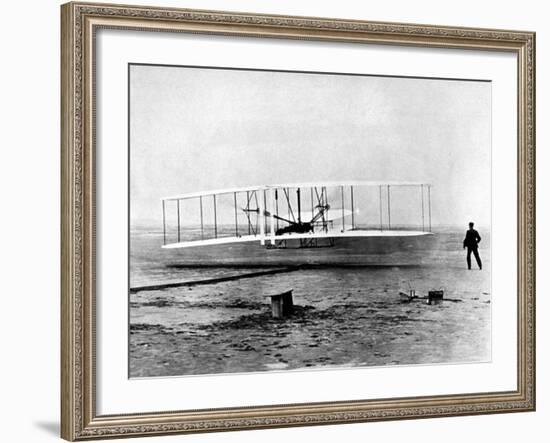 Wright Brothers Wilbur and Orville with 1903 Airplane "Kitty Hawk" on First Flight-null-Framed Premium Photographic Print