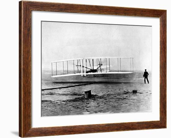 Wright Brothers Wilbur and Orville with 1903 Airplane "Kitty Hawk" on First Flight-null-Framed Premium Photographic Print
