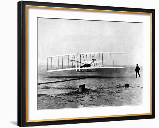 Wright Brothers Wilbur and Orville with 1903 Airplane "Kitty Hawk" on First Flight-null-Framed Premium Photographic Print