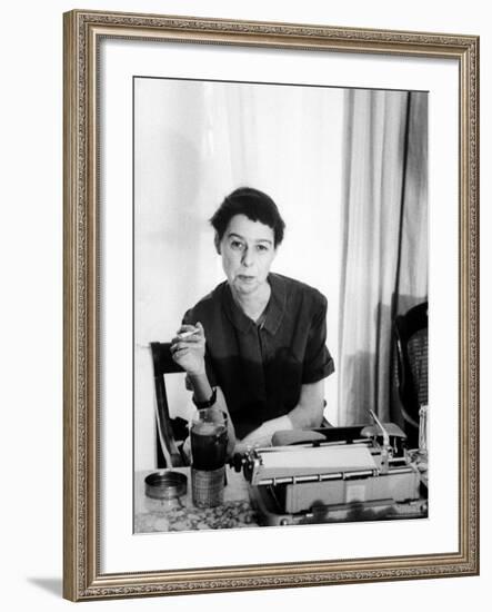 Writer Carson McCullers Sitting at Typewriter-Leonard Mccombe-Framed Premium Photographic Print