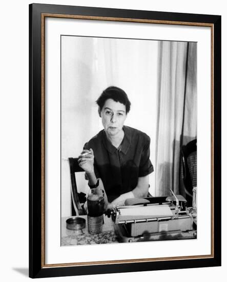 Writer Carson McCullers Sitting at Typewriter-Leonard Mccombe-Framed Premium Photographic Print