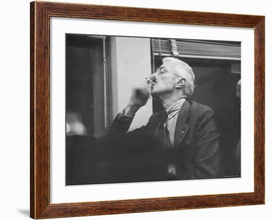 Writer Dashiell Hammett Smoking a Cigarette-Paul Dorsey-Framed Premium Photographic Print