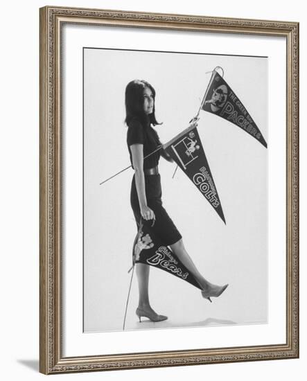 Writer Gloria Steinem Carrying Banners for Professional Football Teams-Yale Joel-Framed Premium Photographic Print