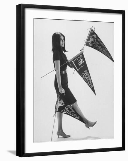 Writer Gloria Steinem Carrying Banners for Professional Football Teams-Yale Joel-Framed Premium Photographic Print