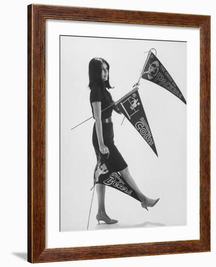 Writer Gloria Steinem Carrying Banners for Professional Football Teams-Yale Joel-Framed Premium Photographic Print
