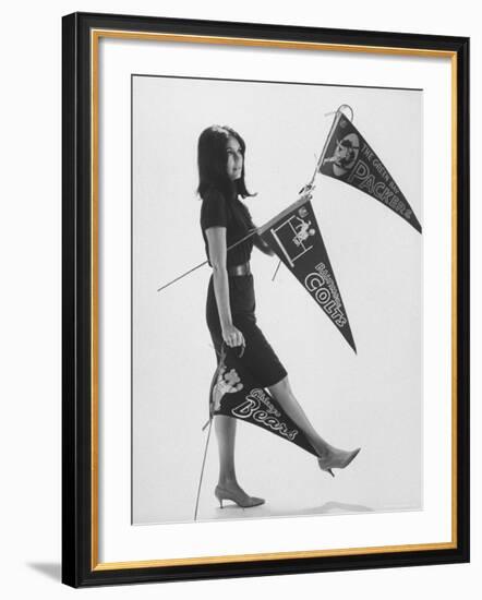 Writer Gloria Steinem Carrying Banners for Professional Football Teams-Yale Joel-Framed Premium Photographic Print