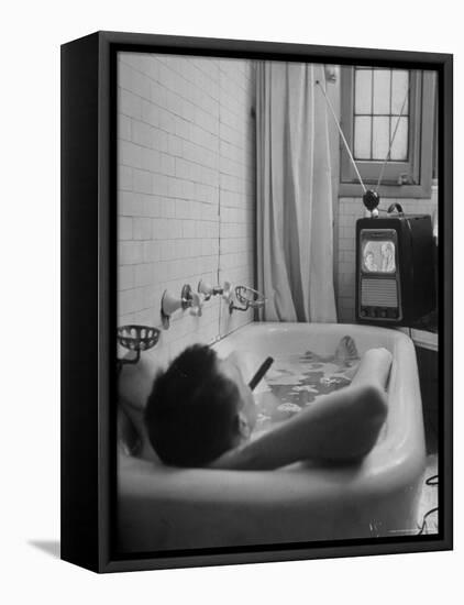 Writer Russell Finch Taking Portable Television Set to Bathroom During His Bath-George Skadding-Framed Premier Image Canvas