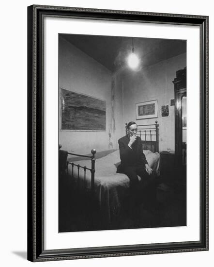 Writer William S. Burroughs Smoking on Bed in His Hotel Room-Loomis Dean-Framed Premium Photographic Print