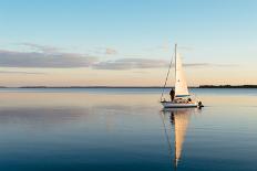 Sailing Boat on a Calm Lake with Reflection in the Water. Serene Scene Landscape. Horizontal Photog-Wstockstudio-Photographic Print