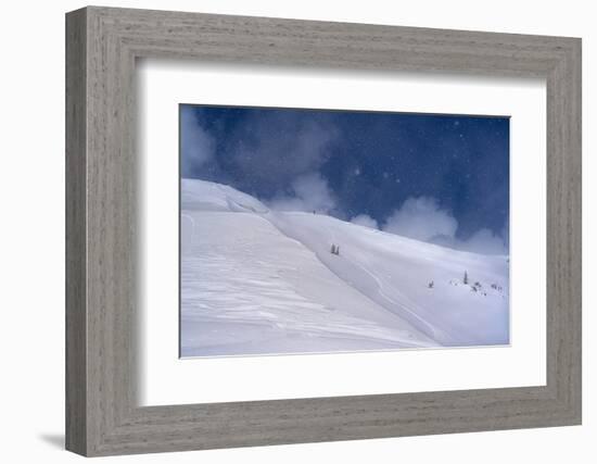 Wyoming. Man getting ready for descent of Mount Taylor, highest peak in Southern Teton Mountains-Howie Garber-Framed Photographic Print