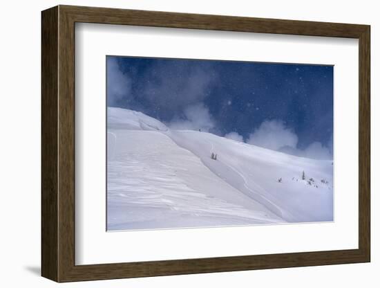 Wyoming. Man getting ready for descent of Mount Taylor, highest peak in Southern Teton Mountains-Howie Garber-Framed Photographic Print